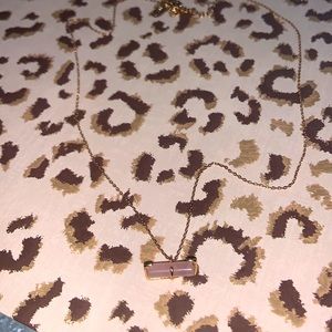 Gold necklace with light pink stone